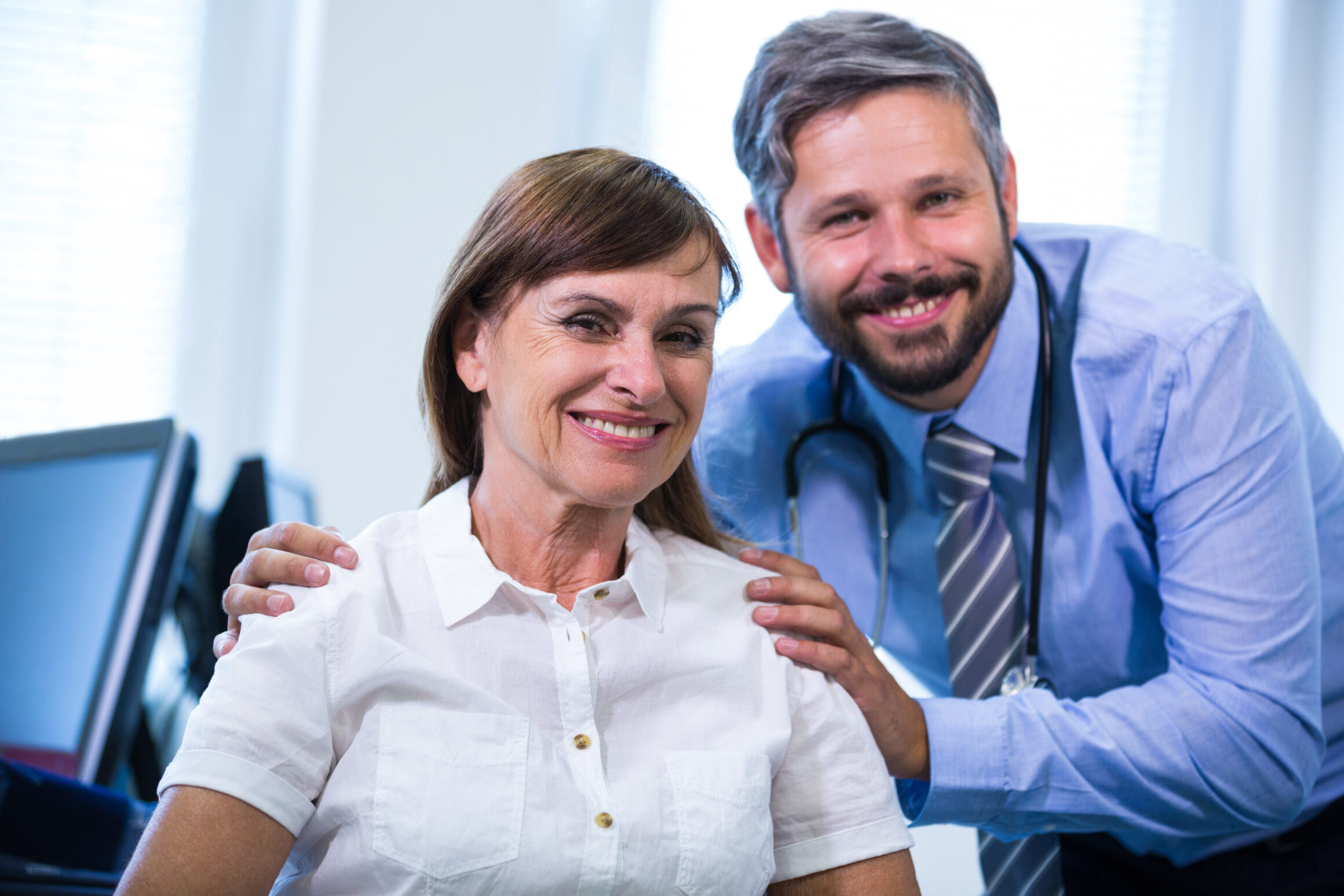 Portrait of a male doctor and patient